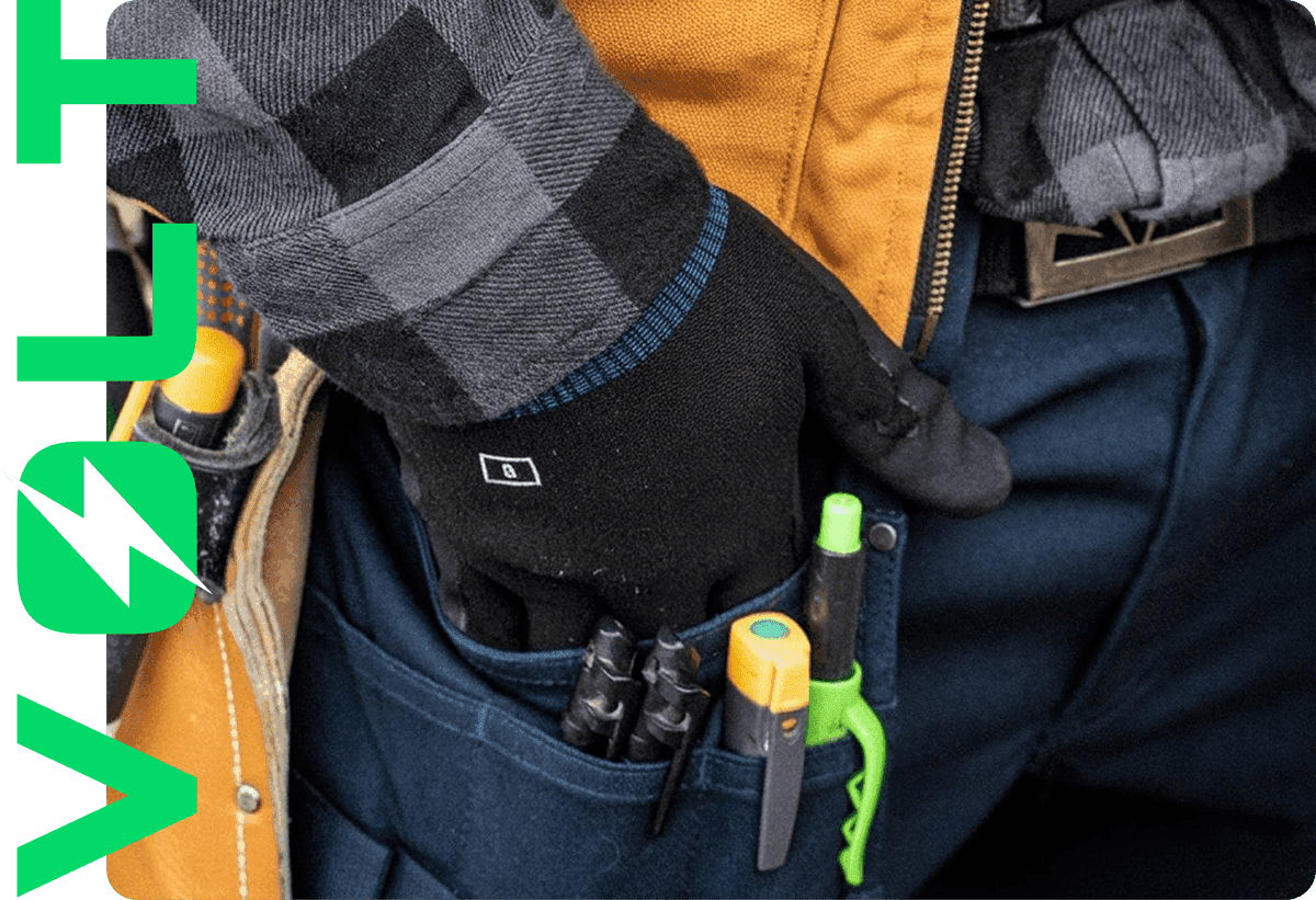 Main d’électricien avec ceinture d’outils Volt Québec Main d’électricien avec ceinture d’outils Volt Québec